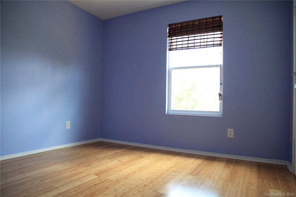 653 Potter Place Road, Unit 110 Fort Mill, SC 29708 - Photo 15 of 22 an empty room with a window