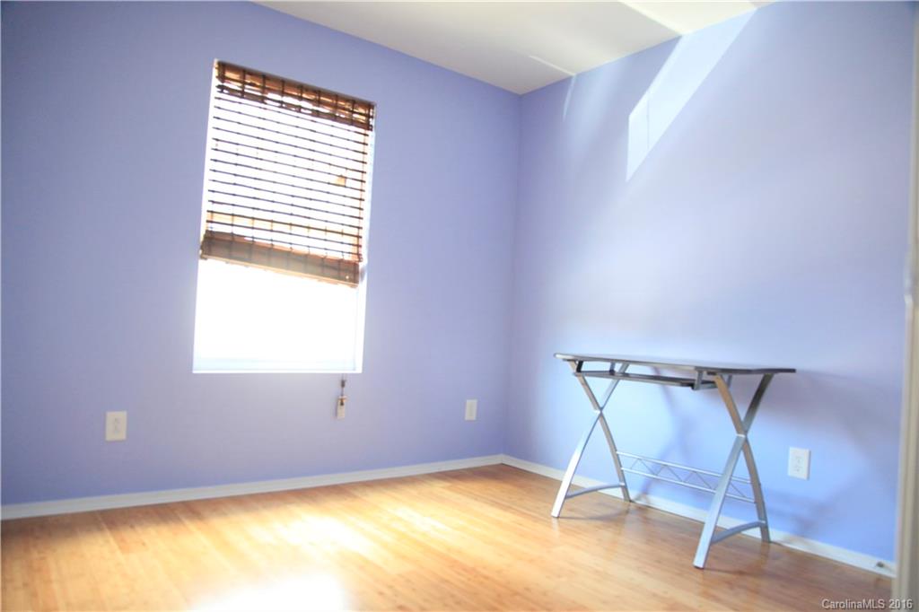 653 Potter Place Road, Unit 110 Fort Mill, SC 29708 - Photo 20 of 22 a view of a room with windows