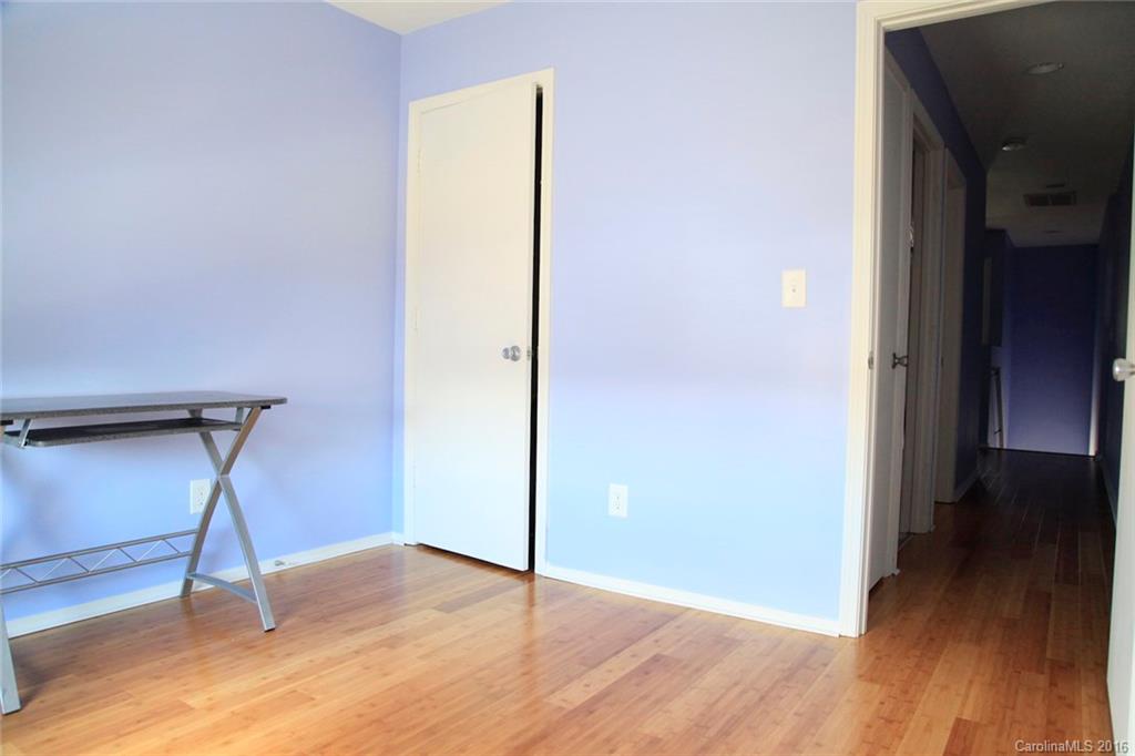 653 Potter Place Road, Unit 110 Fort Mill, SC 29708 - Photo 21 of 22 a view of empty room with wooden floor
