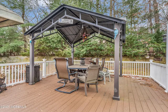 a view of a chairs and table in the deck