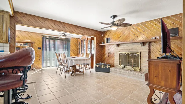 a view of a livingroom with furniture and a fireplace