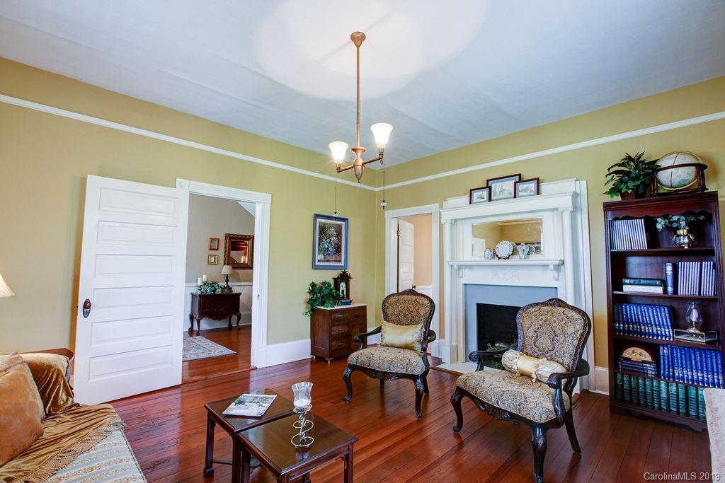 1003 Ferguson Ridge Road Gastonia, NC 28052 - Photo 4 of 36 a living room with furniture and a fireplace