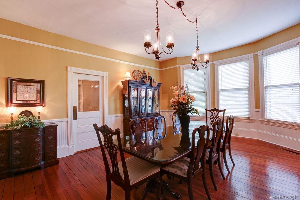 1003 Ferguson Ridge Road Gastonia, NC 28052 - Photo 6 of 36 a view of a dining room with furniture window and wooden floor