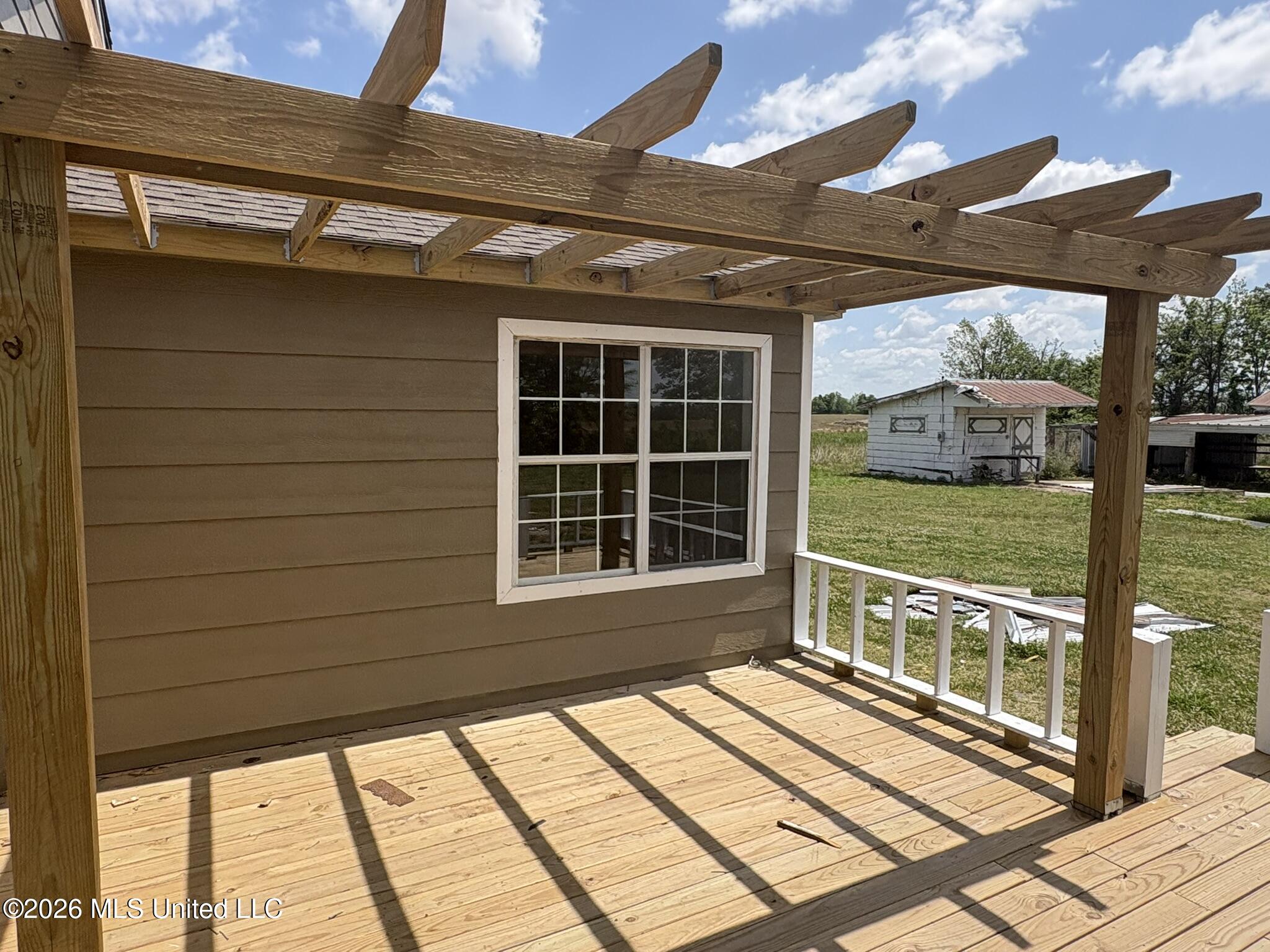 161 Smith Road Cleveland, MS 38732 - Photo 20 of 27 161 Smith Road Pergola Deck 1