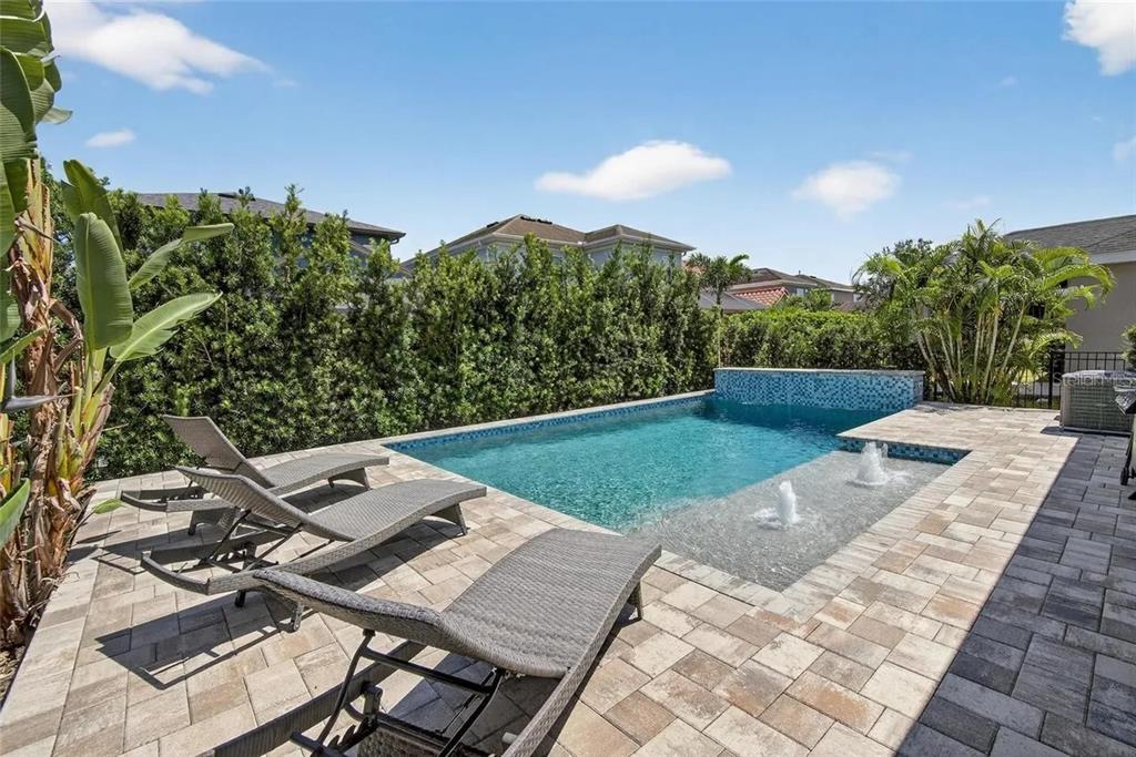 14302 Rolling Dune Road Lithia, FL 33547 - Photo 34 of 88 a view of a terrace with a table and chairs