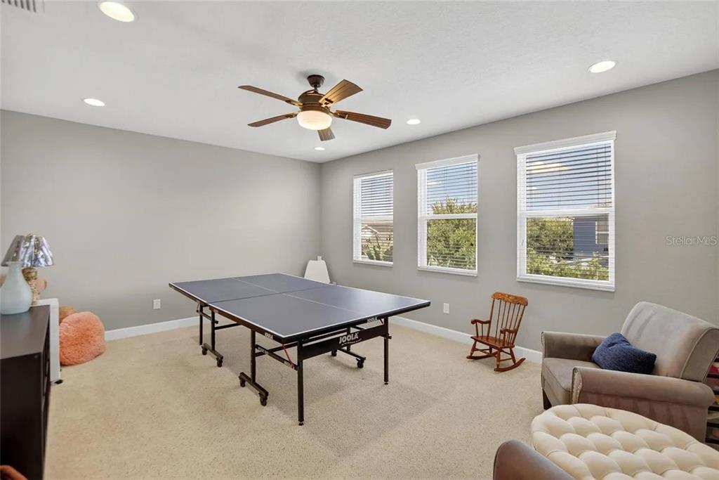 14302 Rolling Dune Road Lithia, FL 33547 - Photo 41 of 88 a view of a livingroom with furniture and a window