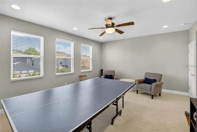 a view of a chairs and tables in the patio