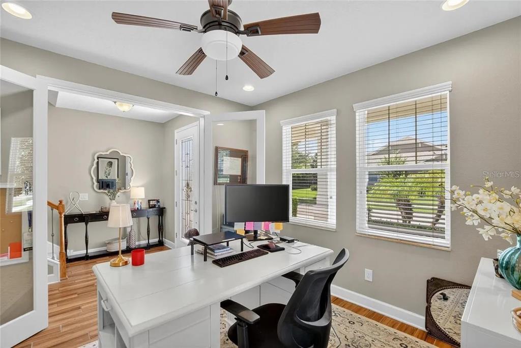 14302 Rolling Dune Road Lithia, FL 33547 - Photo 46 of 88 a living room with furniture and a flat screen tv