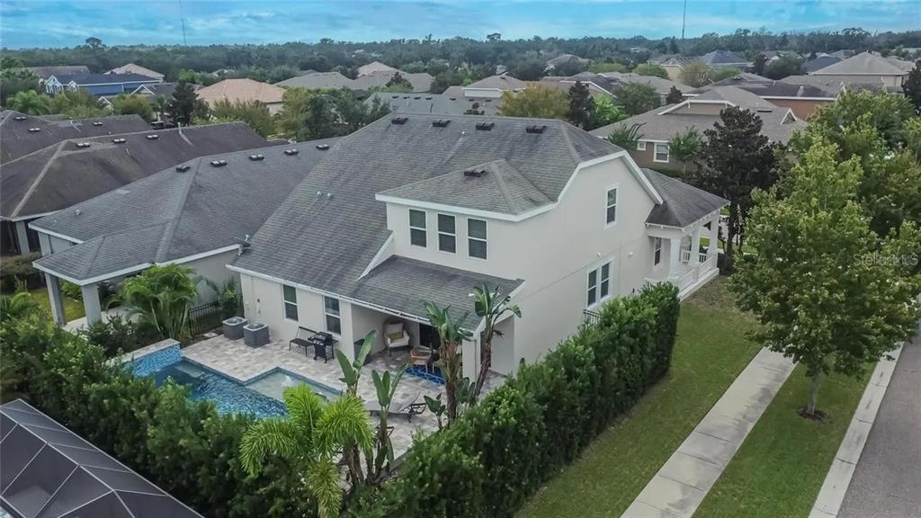 14302 Rolling Dune Road Lithia, FL 33547 - Photo 64 of 88 an aerial view of multiple houses with a yard