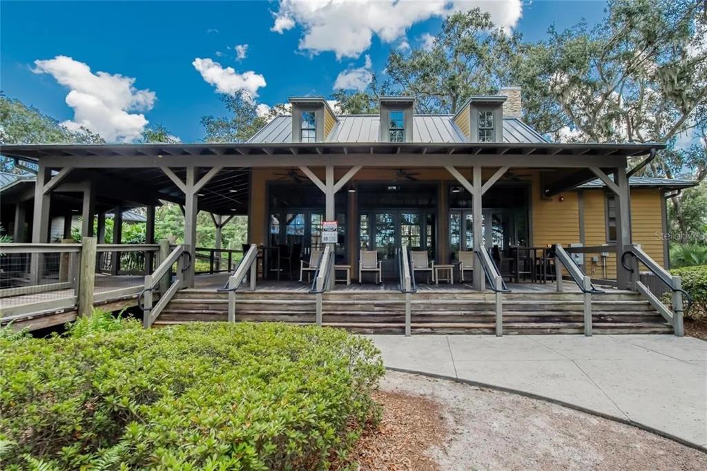 14302 Rolling Dune Road Lithia, FL 33547 - Photo 67 of 88 a view of a chairs and tables in the patio