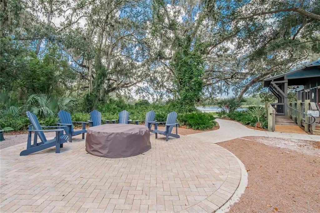14302 Rolling Dune Road Lithia, FL 33547 - Photo 80 of 88 a view of backyard with outdoor seating and trees