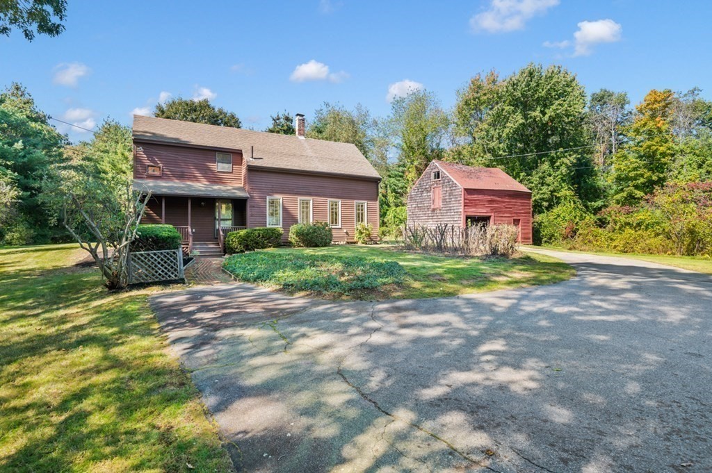 a house view with a garden space