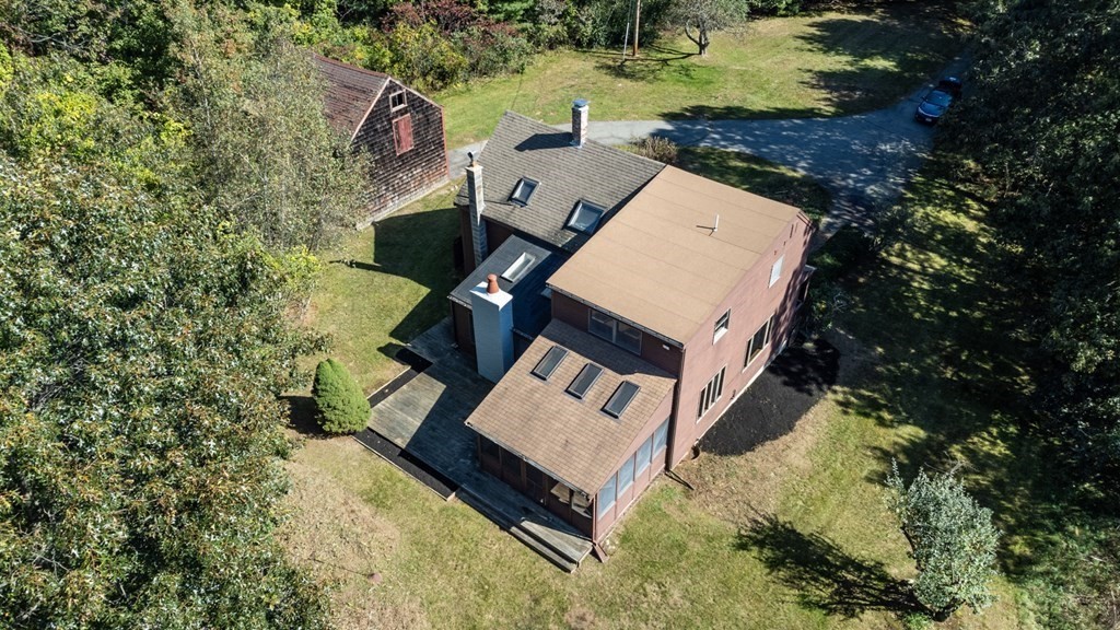 54 Harriman Road Merrimac, MA 01860 - Photo 30 of 39 an aerial view of a house with a yard and street