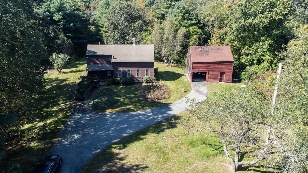 54 Harriman Road Merrimac, MA 01860 - Photo 3 of 39 an aerial view of a house with a yard