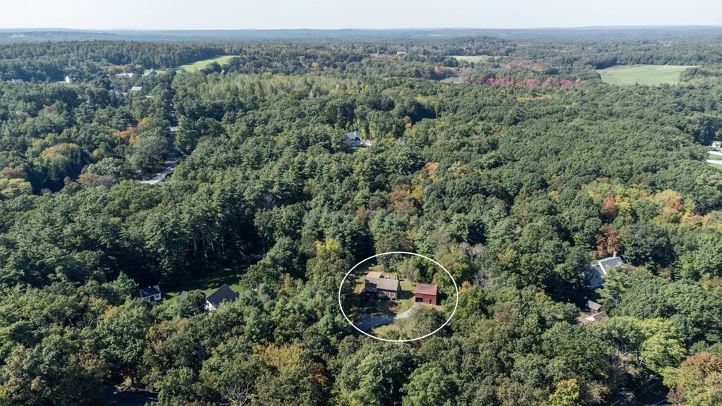 54 Harriman Road Merrimac, MA 01860 - Photo 34 of 39 an aerial view of a house with a yard
