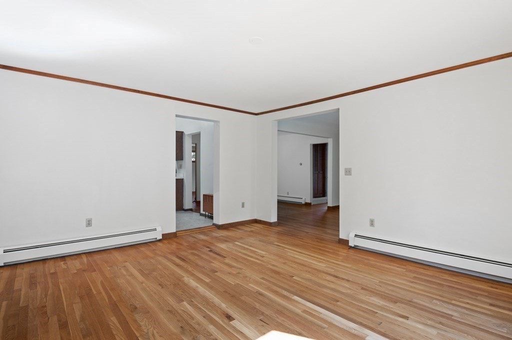 54 Harriman Road Merrimac, MA 01860 - Photo 7 of 39 a view of empty room with wooden floor