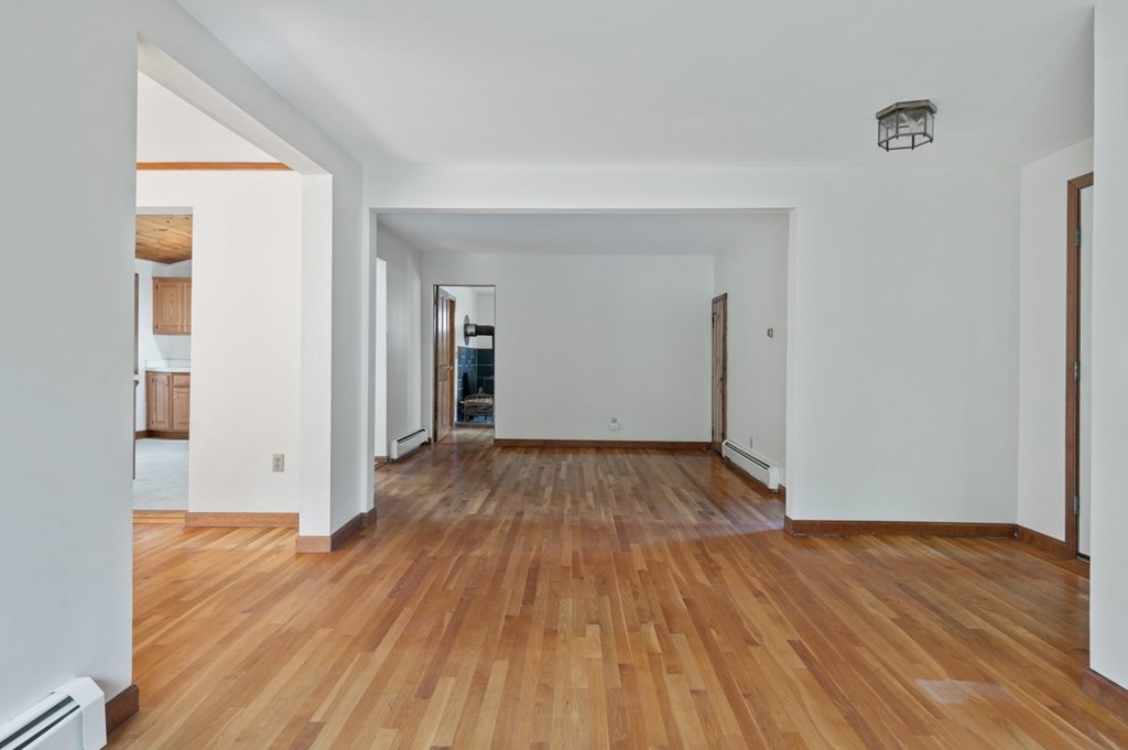 54 Harriman Road Merrimac, MA 01860 - Photo 8 of 39 a view of a room with wooden floor