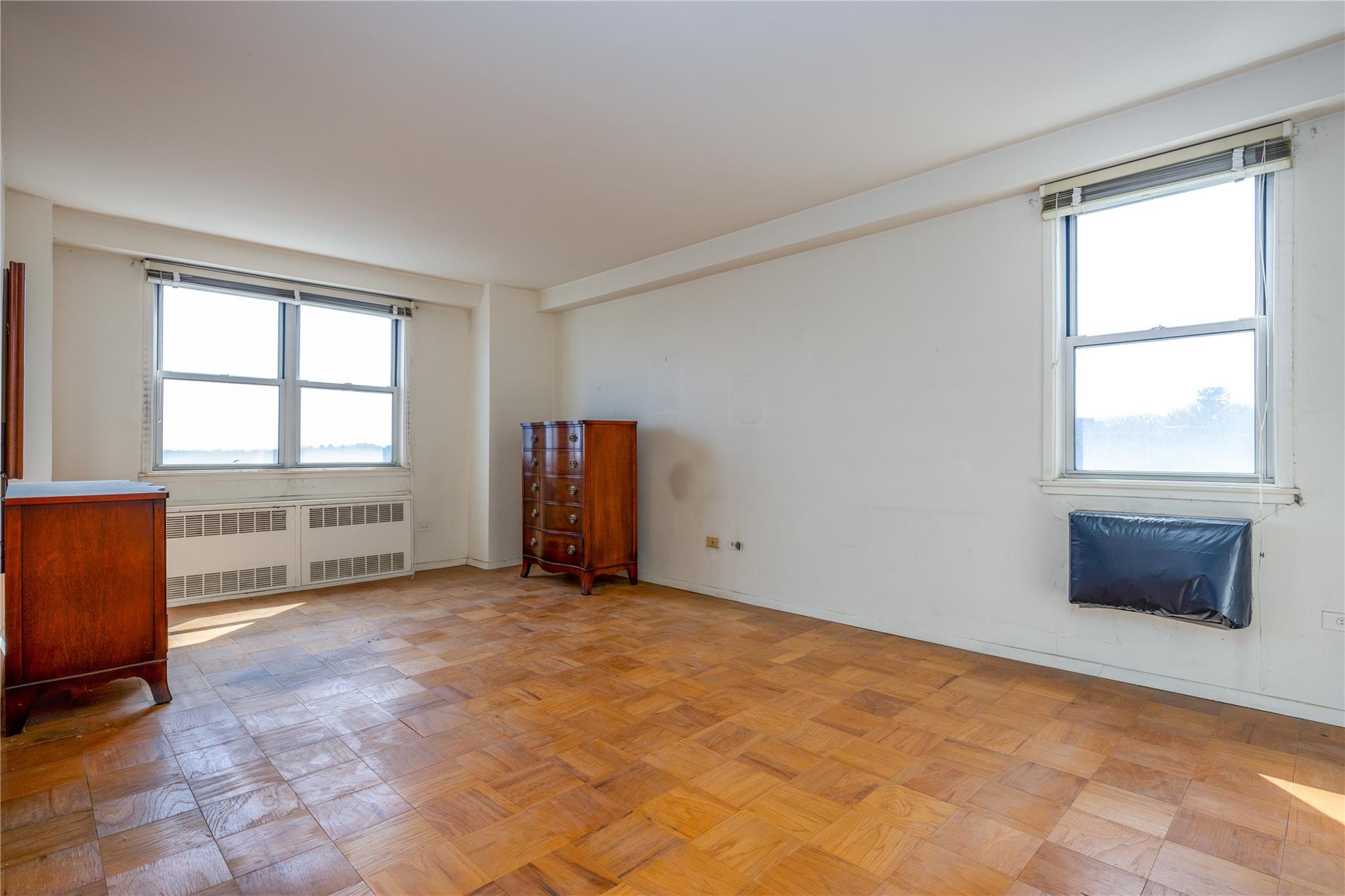 615 Palmer Road, Unit 602 Yonkers, NY 10701 - Photo 12 of 23 an empty room with windows