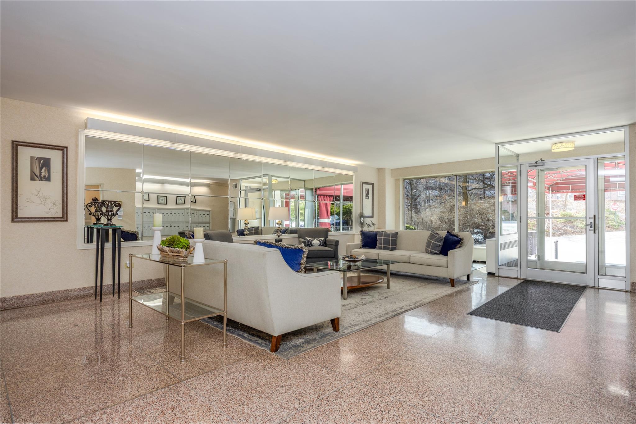 615 Palmer Road, Unit 602 Yonkers, NY 10701 - Photo 5 of 23 a living room with furniture and a large window