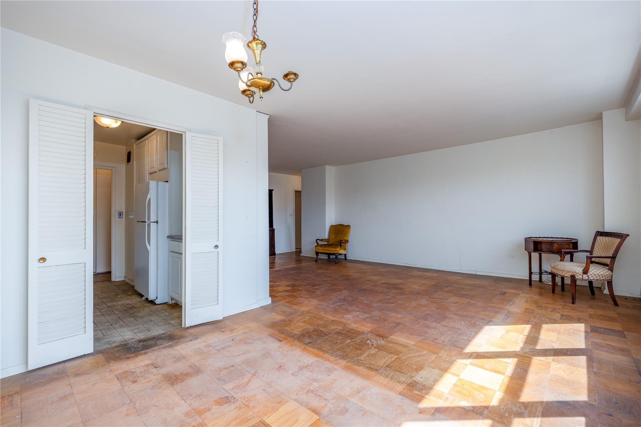 615 Palmer Road, Unit 602 Yonkers, NY 10701 - Photo 9 of 23 a view of a dining room with a window and furniture