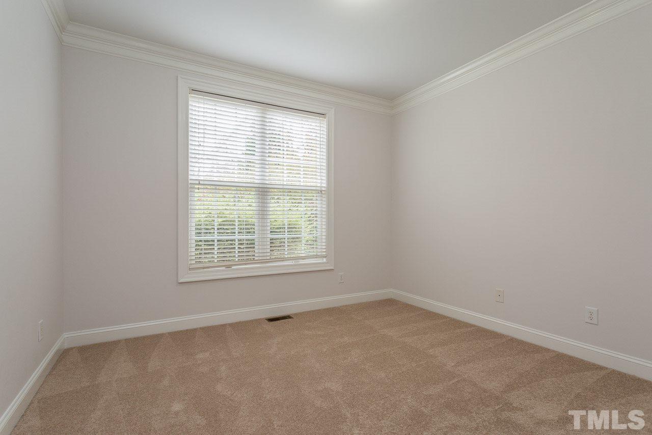 4208 Russling Leaf Lane Raleigh, NC 27613 - Photo 14 of 25 an empty room with a window