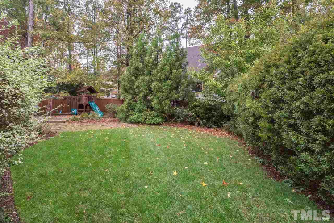 4208 Russling Leaf Lane Raleigh, NC 27613 - Photo 3 of 25 a view of a garden