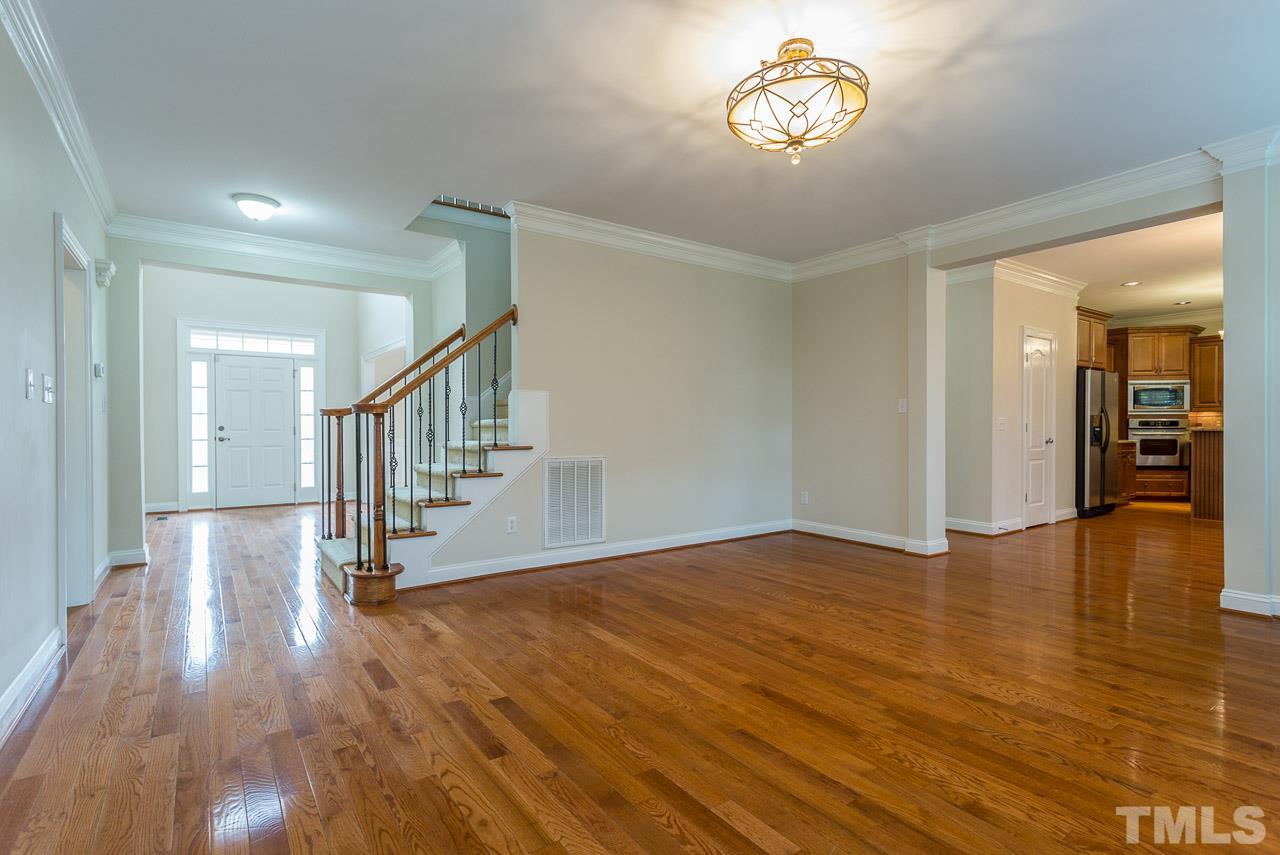4208 Russling Leaf Lane Raleigh, NC 27613 - Photo 10 of 25 a view of entryway with wooden floor