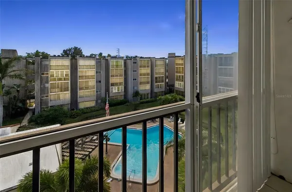 a view of a street from a balcony