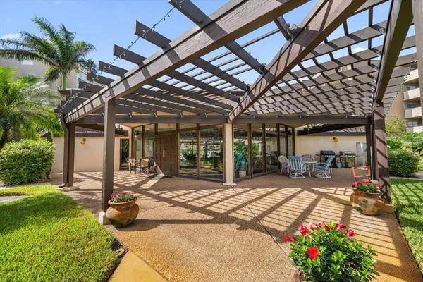 a view of a backyard with patio