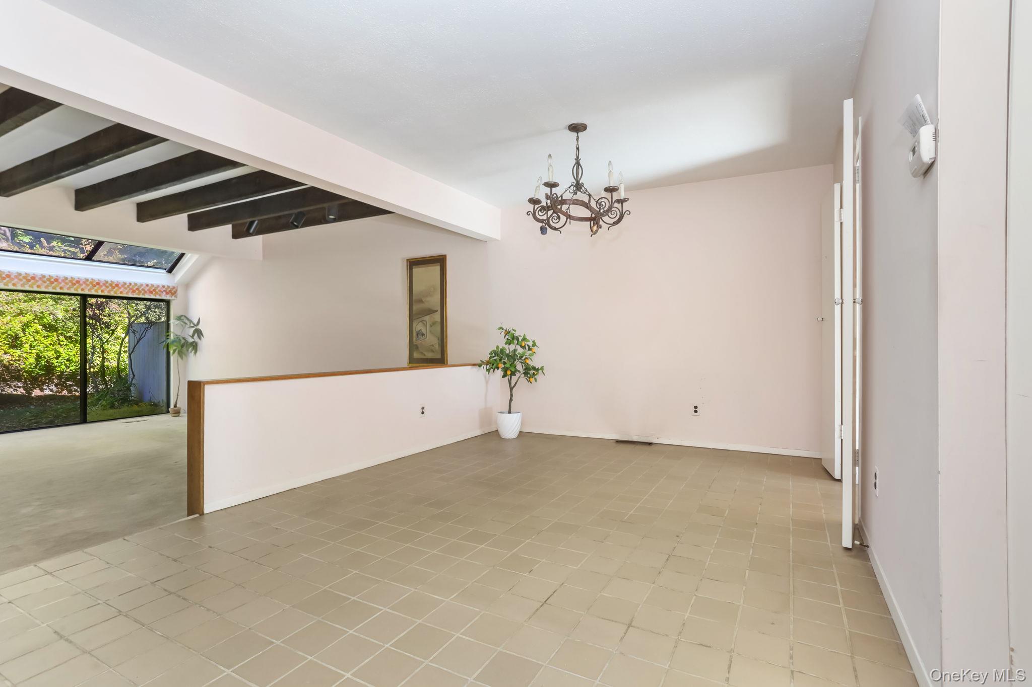 40 Pine Ridge Road Larchmont, NY 10538 - Photo 12 of 40 a view of an empty room with a window