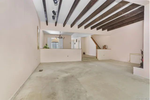 a kitchen that has a sink a refrigerator and a sink