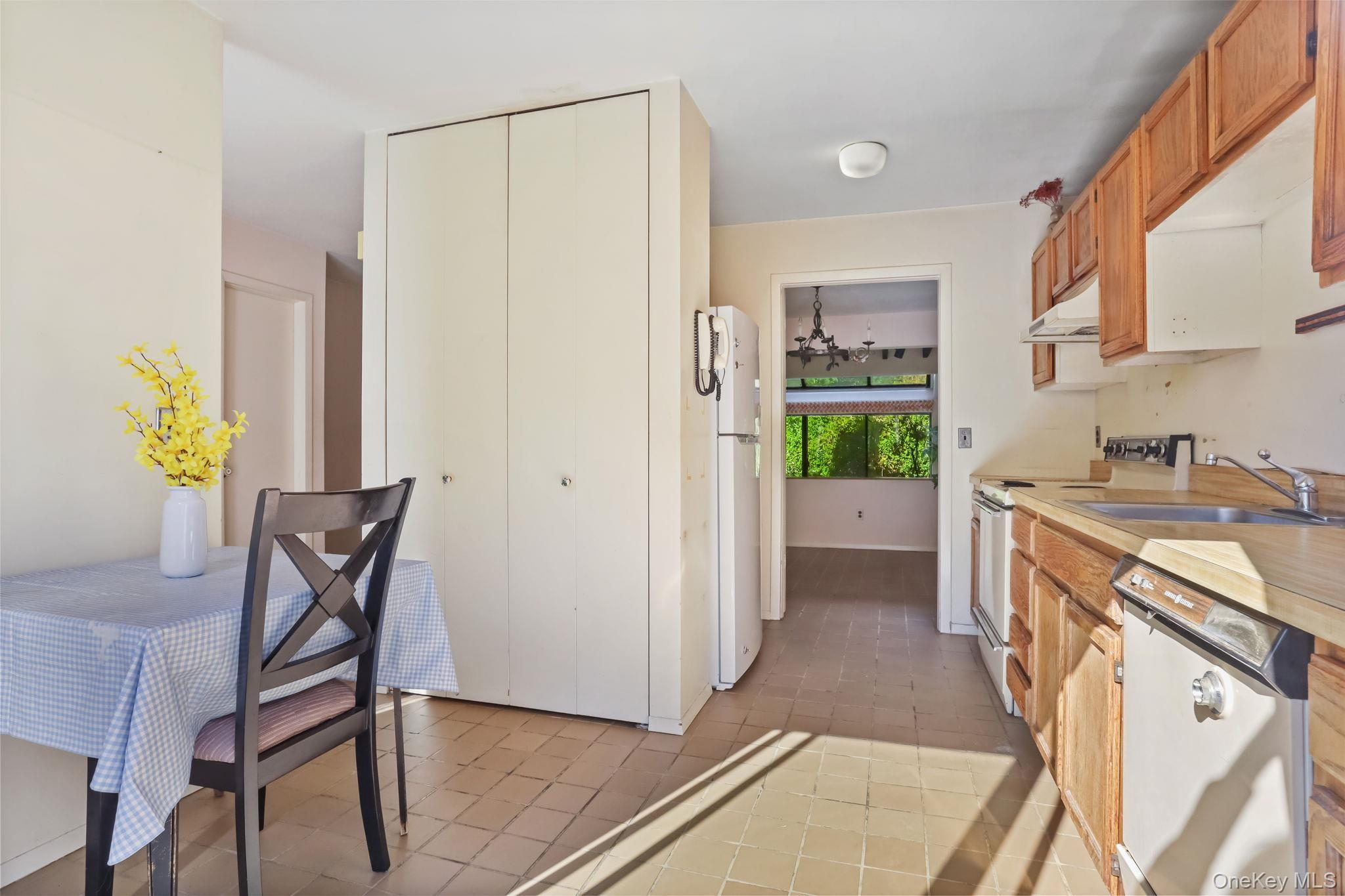 40 Pine Ridge Road Larchmont, NY 10538 - Photo 19 of 40 a view of a kitchen area with furniture and wooden floor