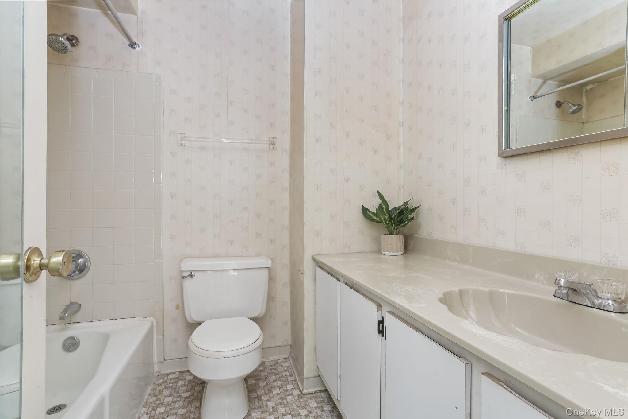 40 Pine Ridge Road Larchmont, NY 10538 - Photo 23 of 40 a bathroom with a granite countertop sink toilet and shower