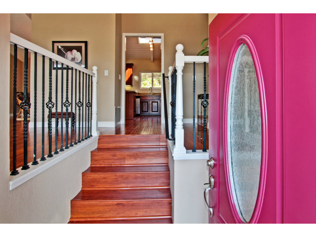 457 Monterey Drive Aptos, CA 95003 - Photo 2 of 11 a front view of a house with entryway and wooden floor