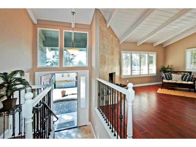 457 Monterey Drive Aptos, CA 95003 - Photo 3 of 11 a view of an entryway with wooden floor and windows
