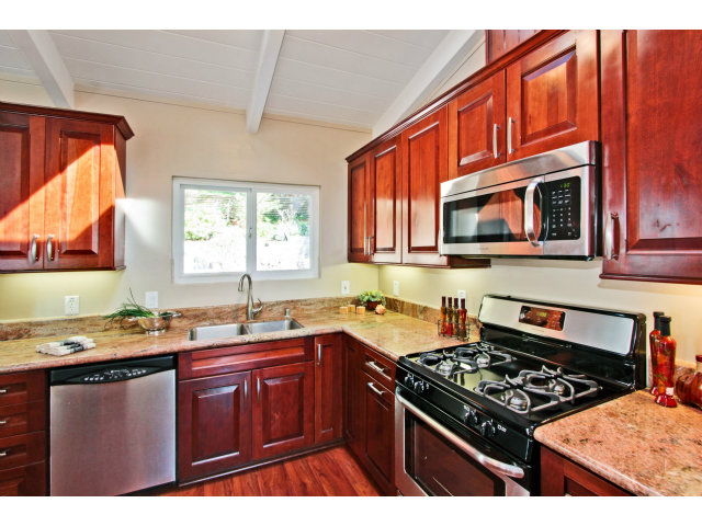 457 Monterey Drive Aptos, CA 95003 - Photo 6 of 11 a kitchen with stainless steel appliances a sink stove and microwave