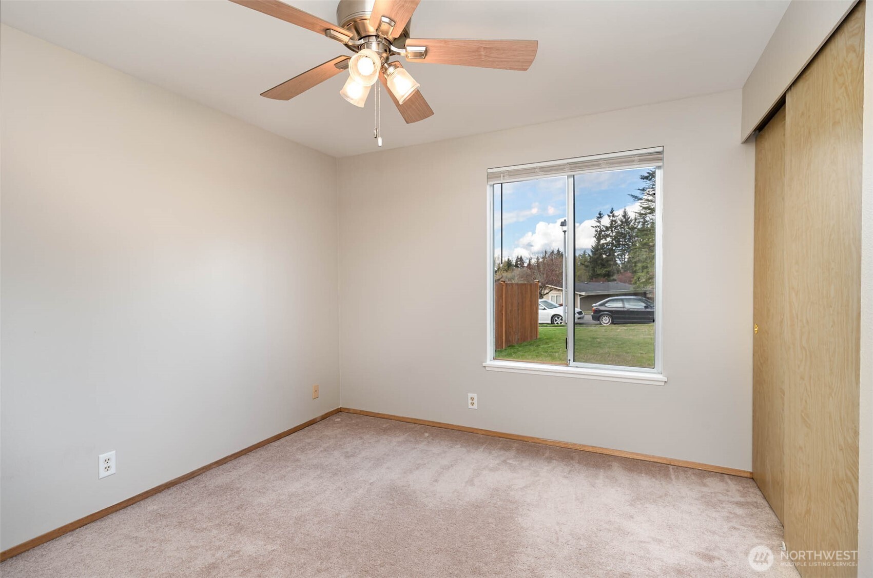 2107 Southeast 21st Court Renton, WA 98055 - Photo 13 of 28 an empty room with a window