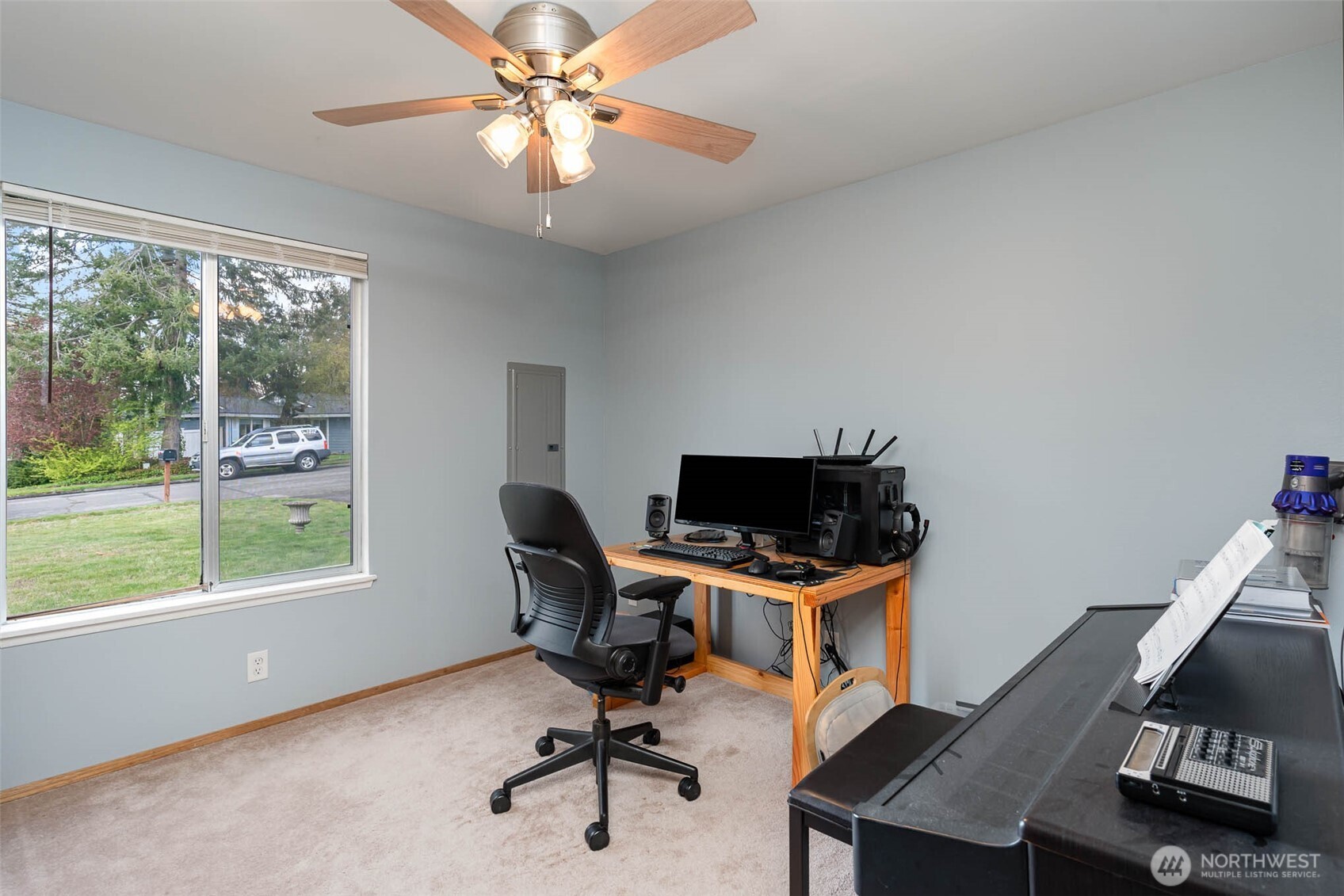 2107 Southeast 21st Court Renton, WA 98055 - Photo 15 of 28 a view of a workspace with furniture and a window