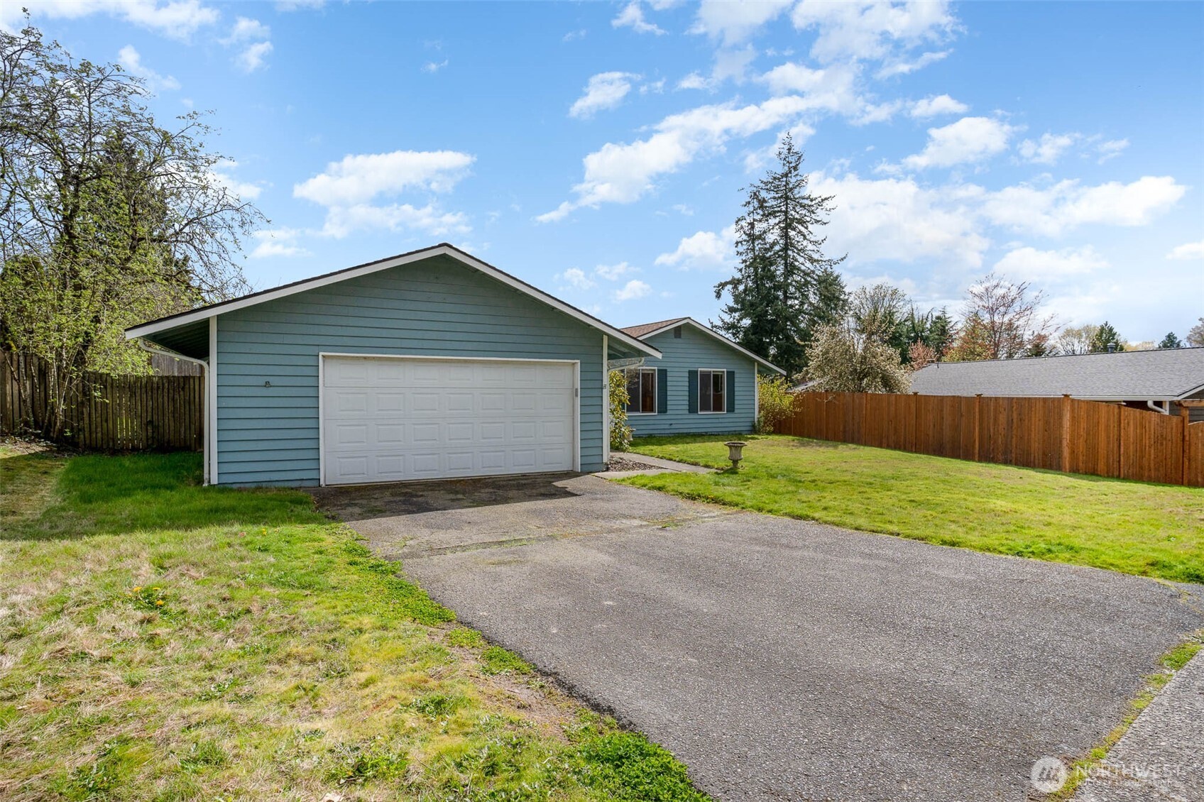 2107 Southeast 21st Court Renton, WA 98055 - Photo 3 of 28 a front view of house with yard and green space