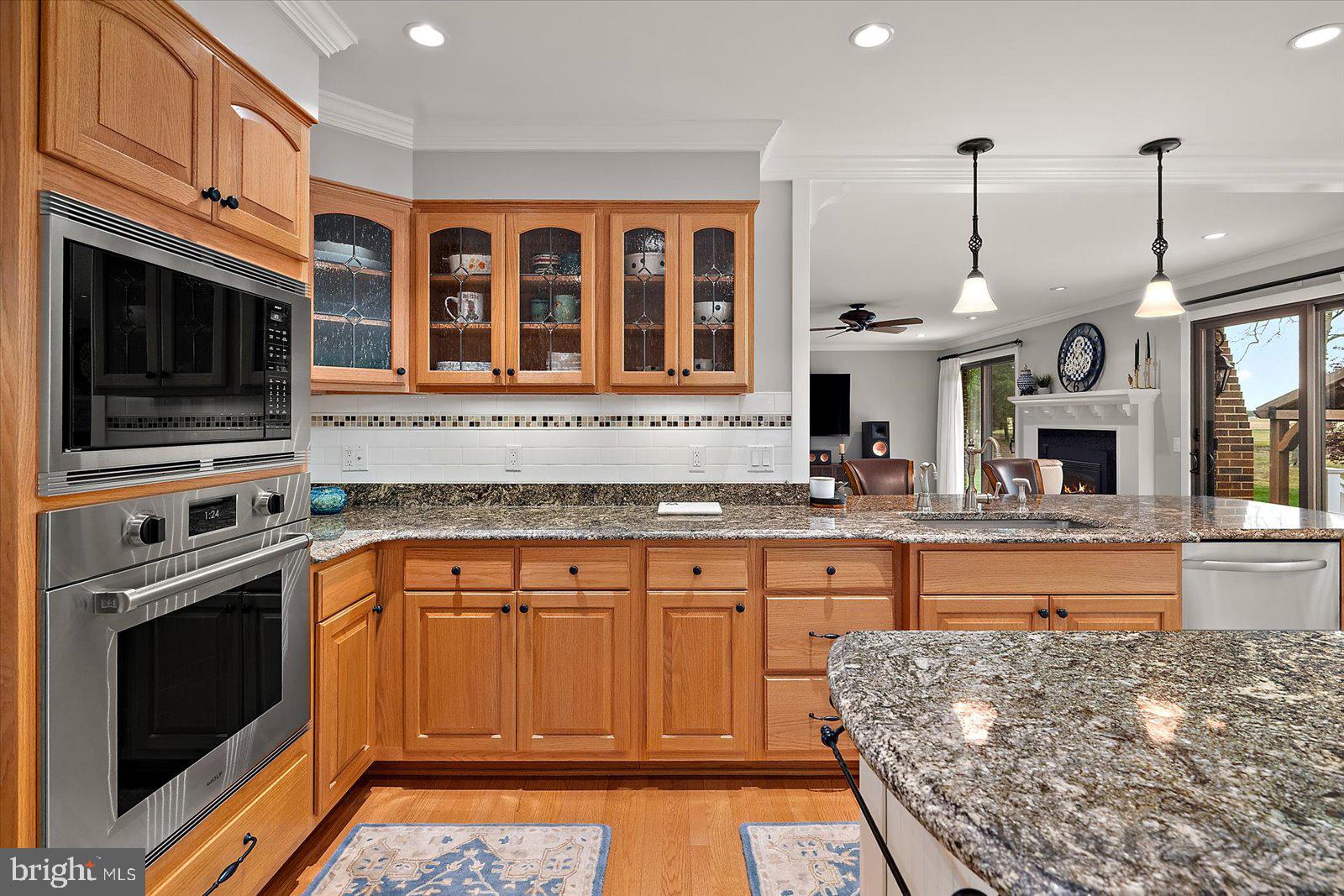 33915 Shockley Road Parsonsburg, MD 21849 - Photo 52 of 125 Warm wood accents in a modern kitchen.