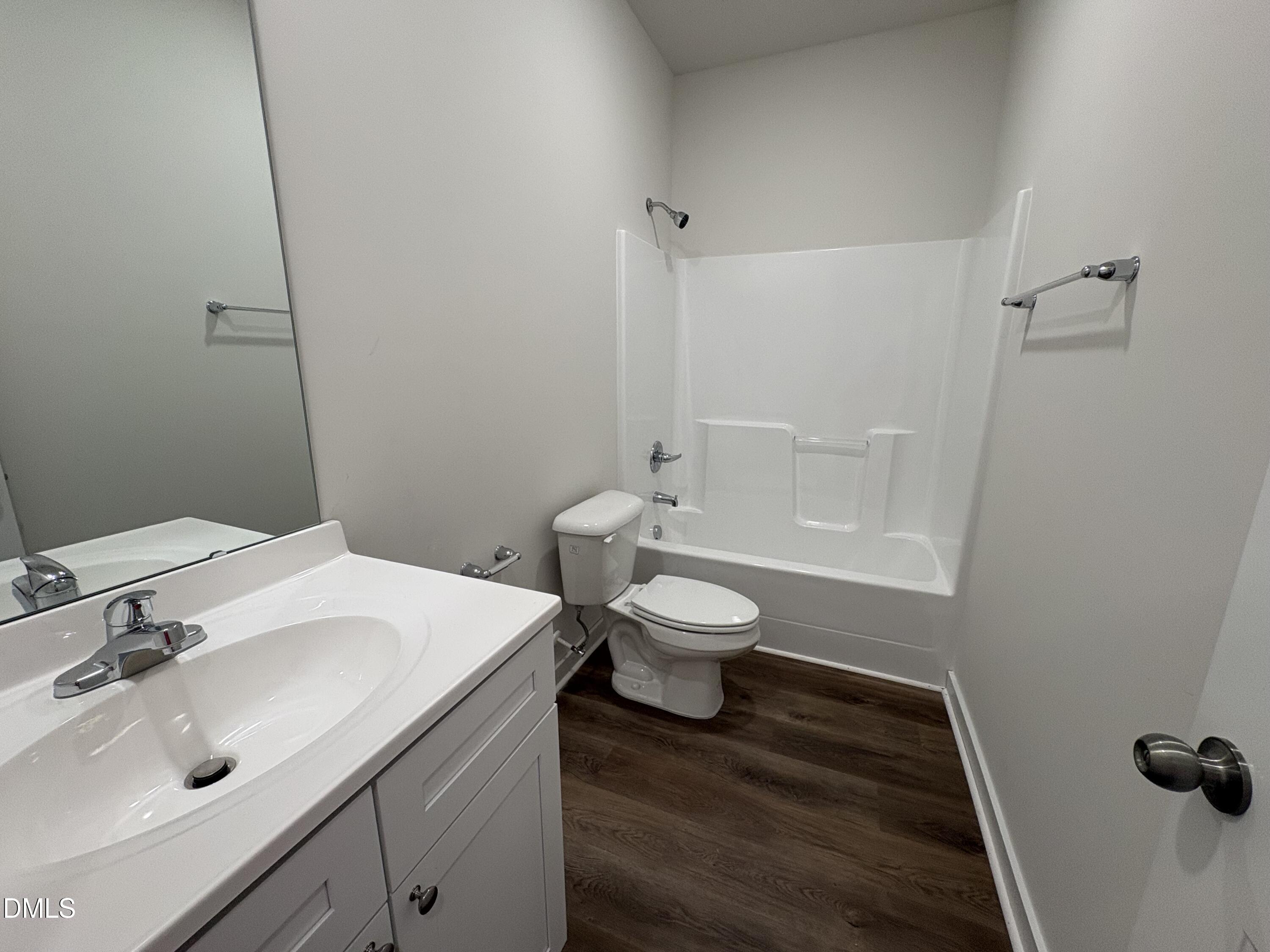 56 Jacobs Ridge Drive Four Oaks, NC 27524 - Photo 15 of 17 a bathroom with a sink toilet and shower