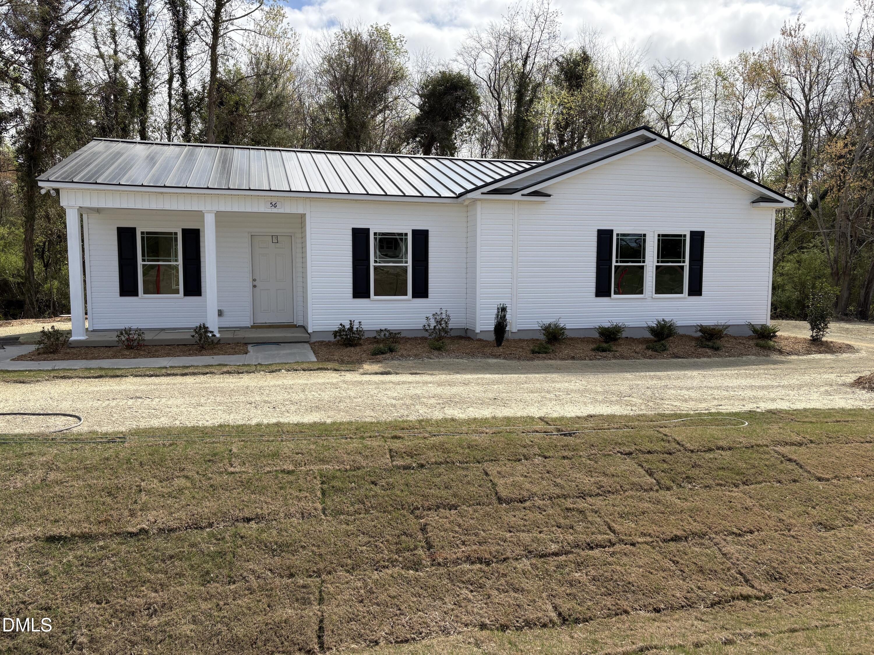 56 Jacobs Ridge Drive Four Oaks, NC 27524 - Photo 2 of 17 a view of front of house with a yard