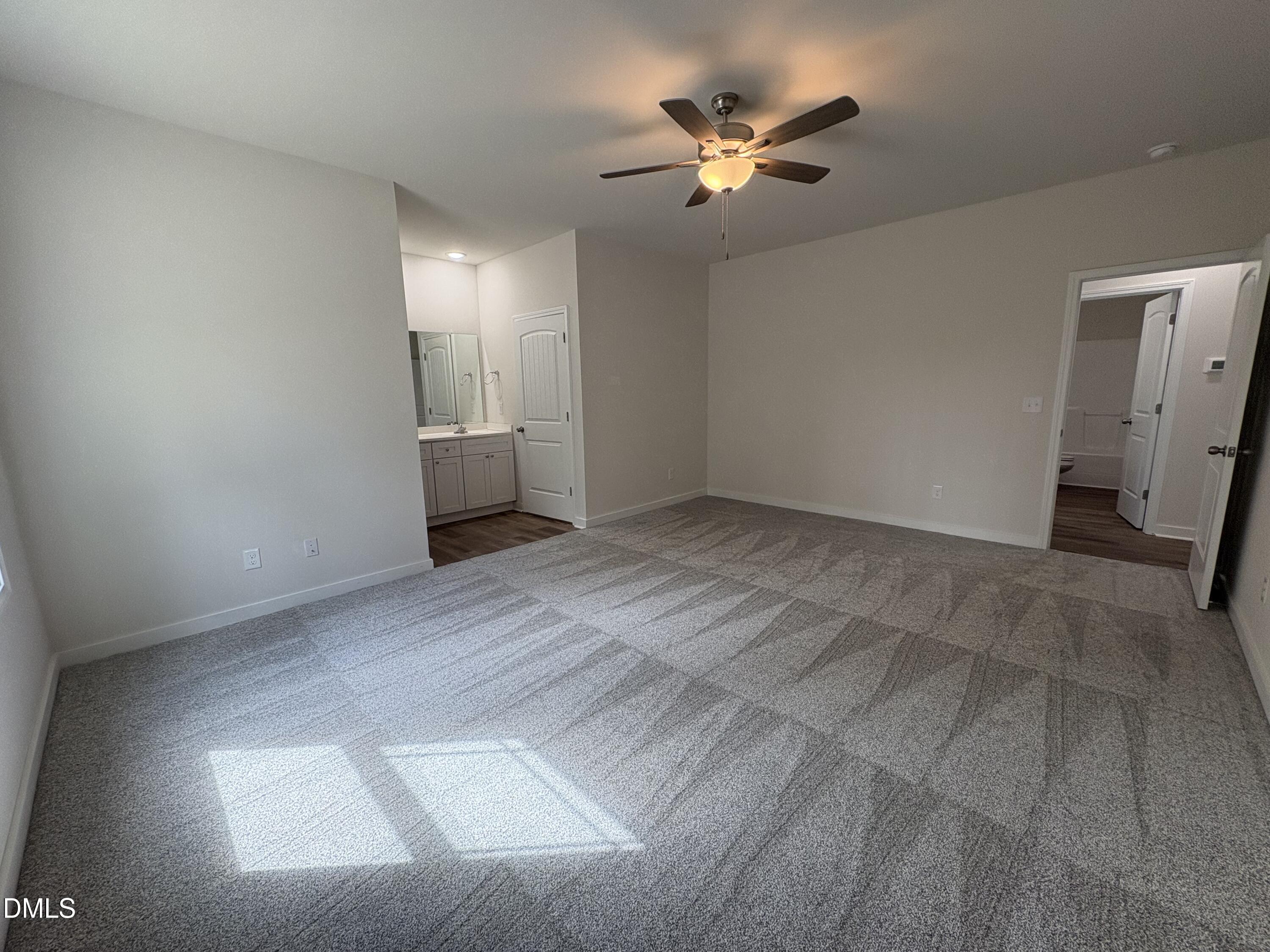 56 Jacobs Ridge Drive Four Oaks, NC 27524 - Photo 10 of 17 an empty room with a bathroom