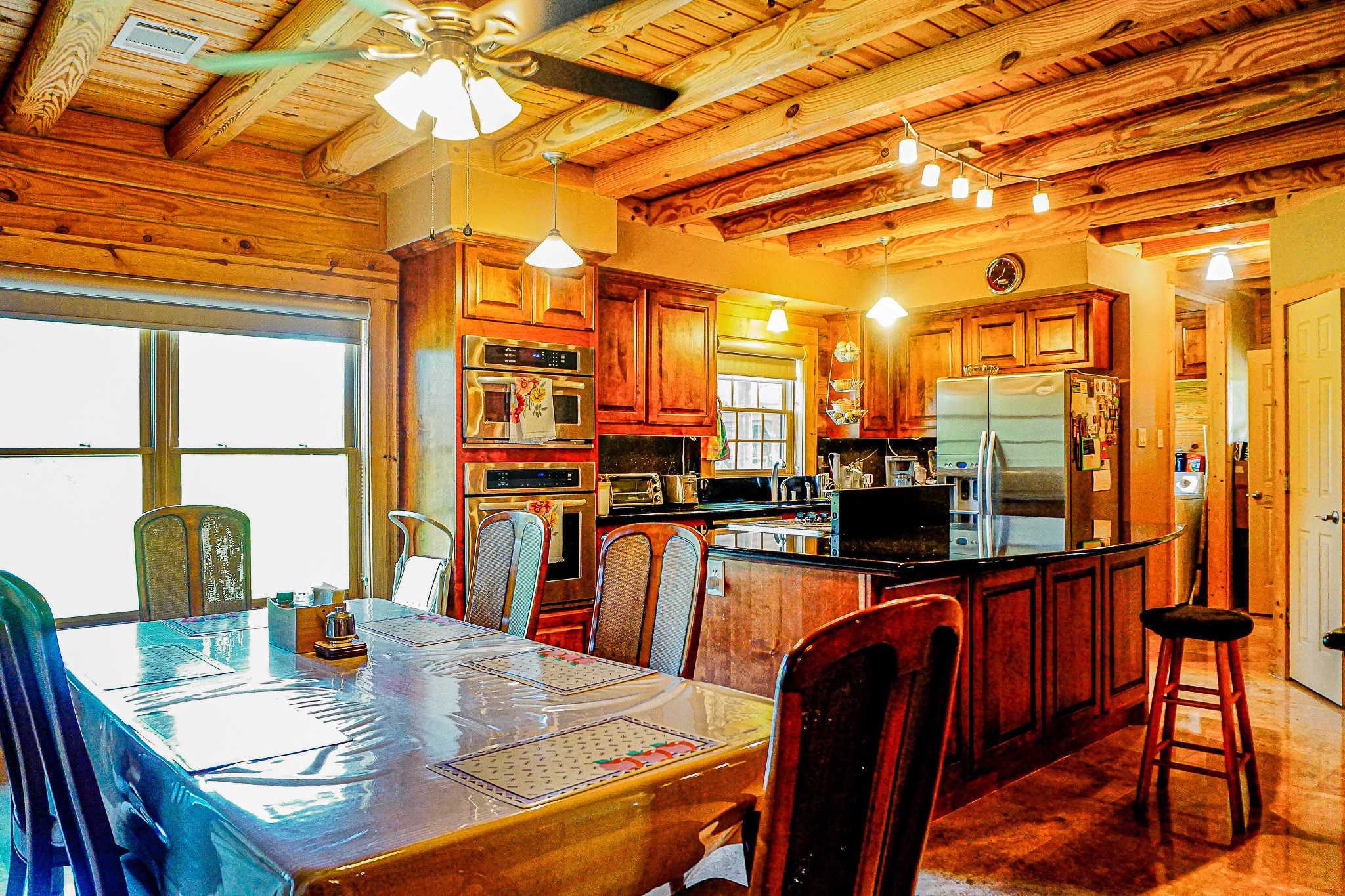 8786 Highway 75 Huntsville, TX 77340 - Photo 11 of 40 a dining room with furniture and a table