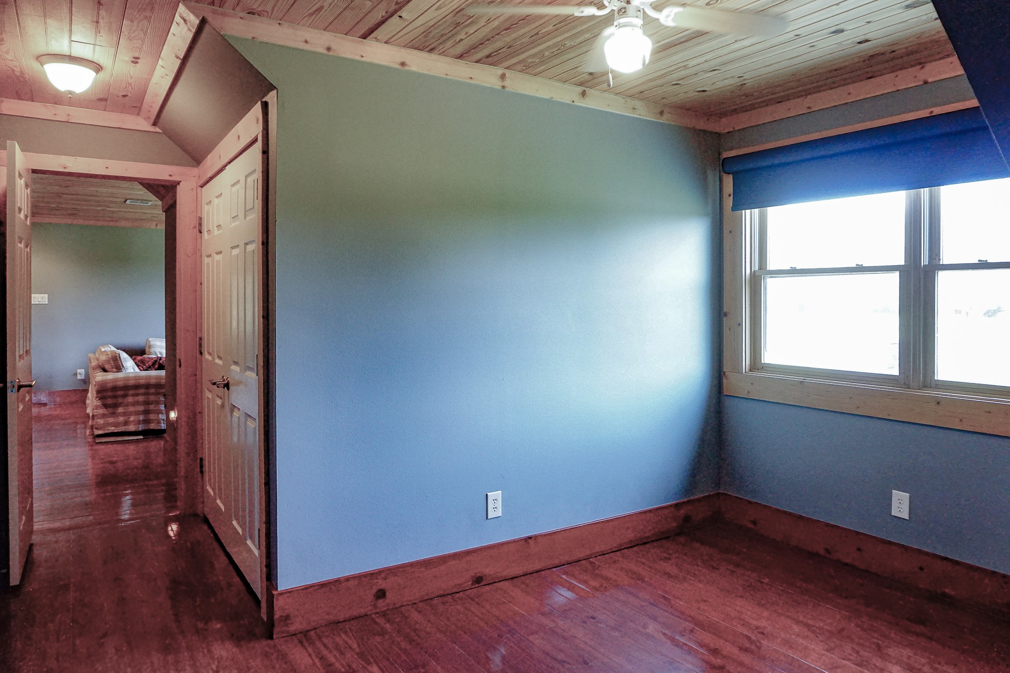 8786 Highway 75 Huntsville, TX 77340 - Photo 28 of 40 a view of empty room with wooden floor