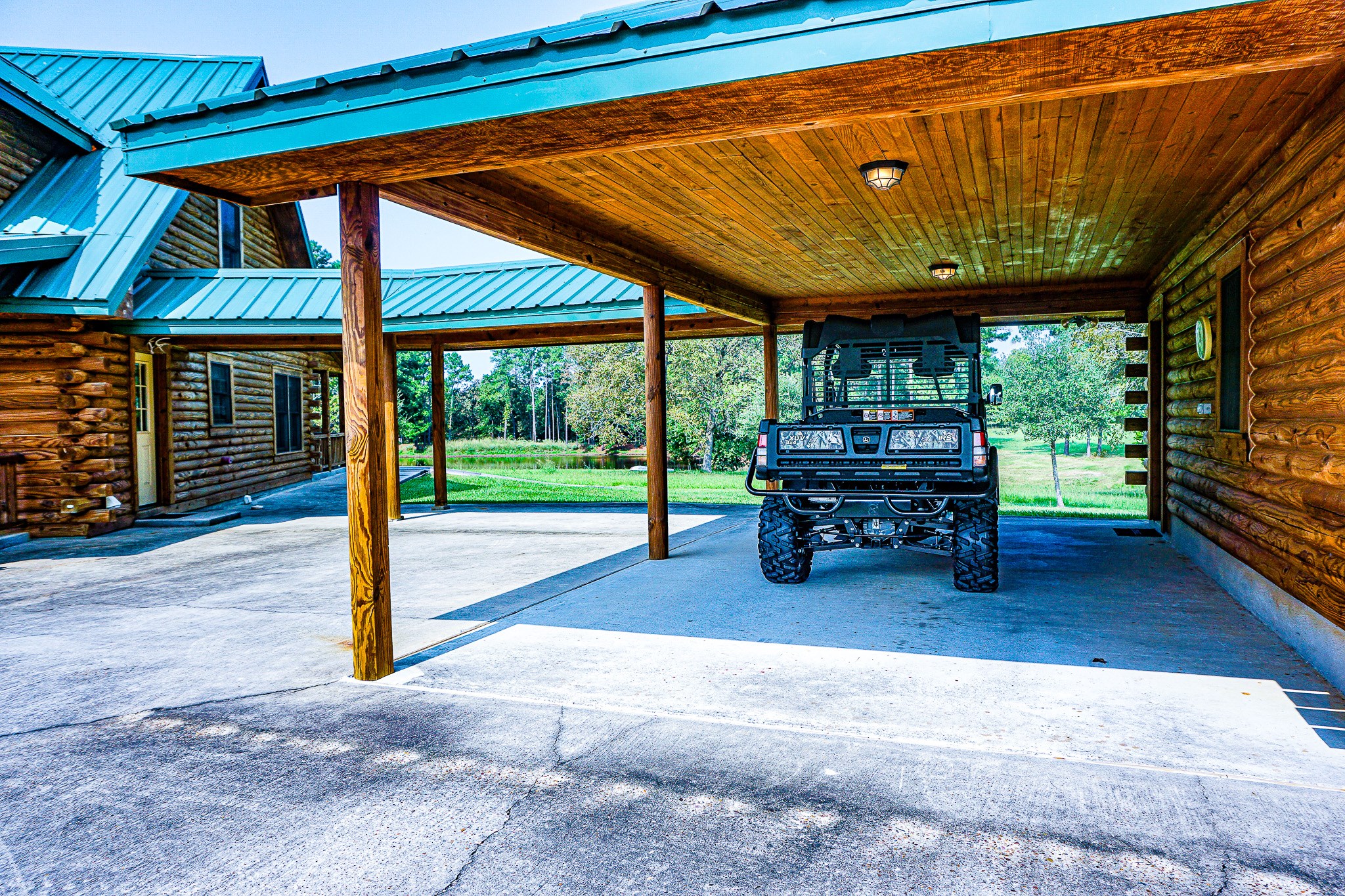 8786 Highway 75 Huntsville, TX 77340 - Photo 32 of 40 a view of a porch with furniture and a backyard