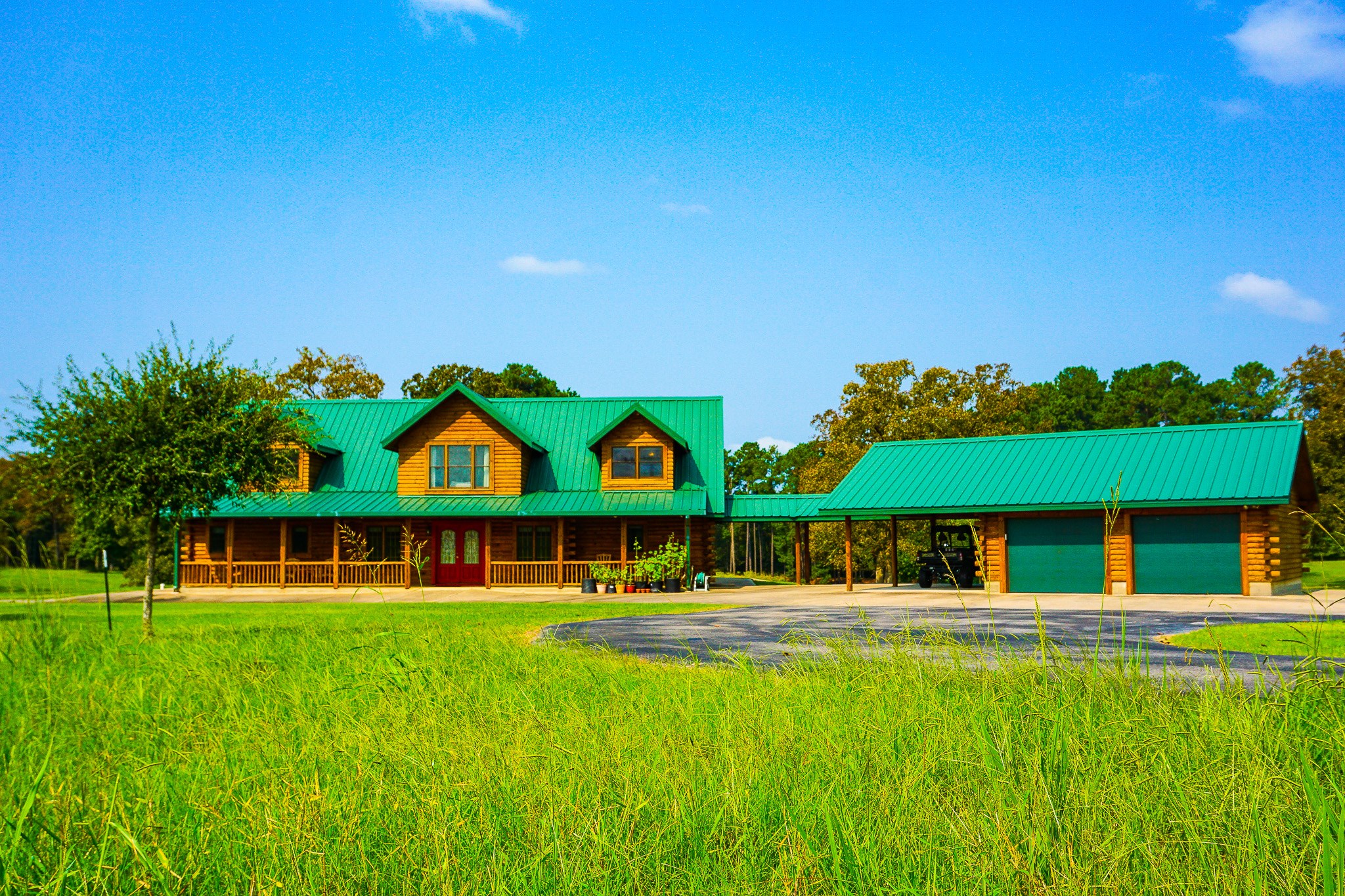 8786 Highway 75 Huntsville, TX 77340 - Photo 40 of 40 a front view of house with yard and outdoor seating