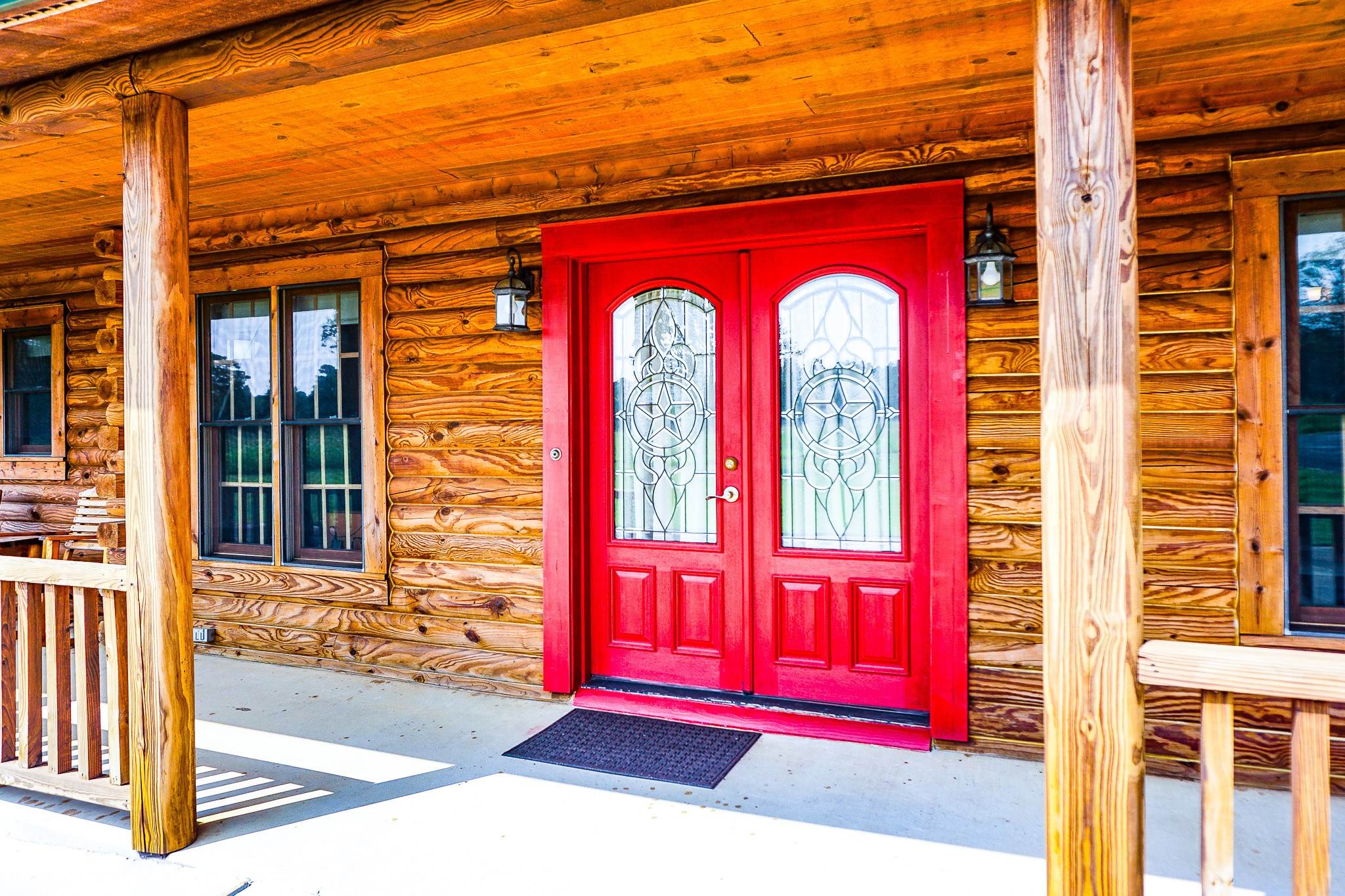 8786 Highway 75 Huntsville, TX 77340 - Photo 4 of 40 a view of a red door of the house