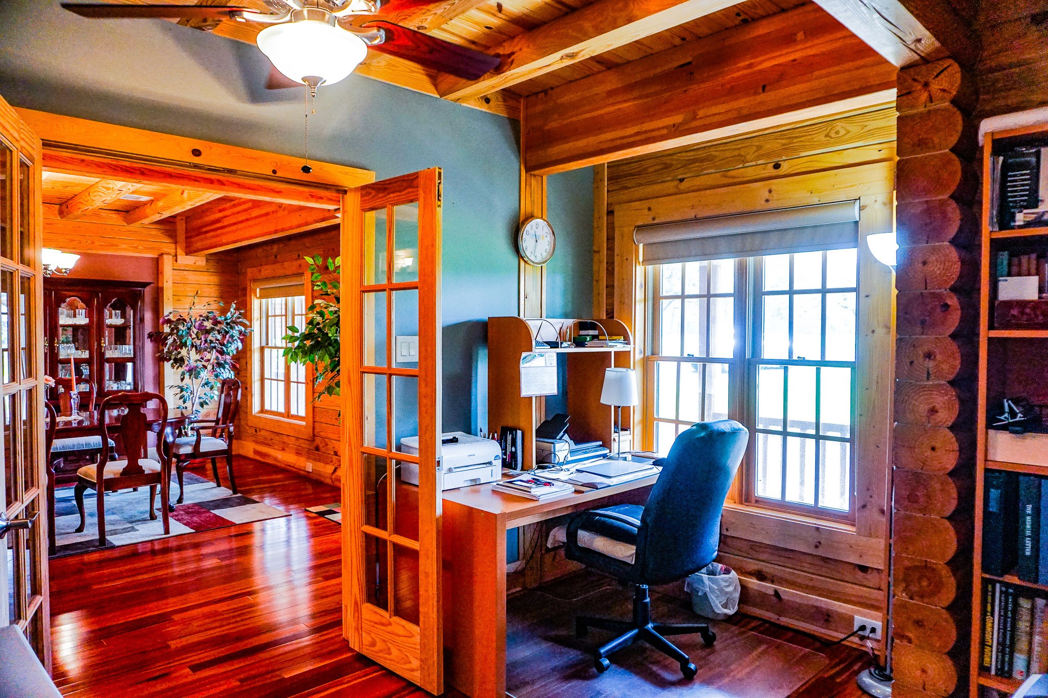 8786 Highway 75 Huntsville, TX 77340 - Photo 9 of 40 a view of a dining room with furniture and wooden floor