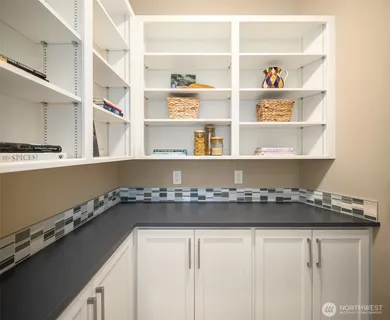 a close view of kitchen cabinets and appliances